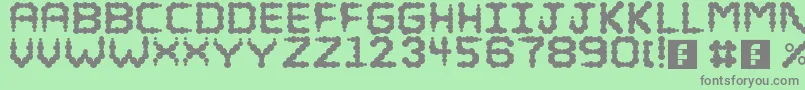 フォントPuffy – 緑の背景に灰色の文字