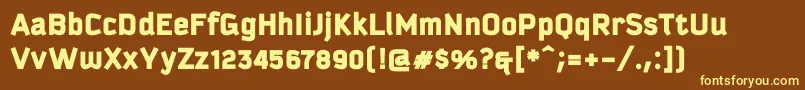 Fonte Kautivablackproc – fontes amarelas em um fundo marrom