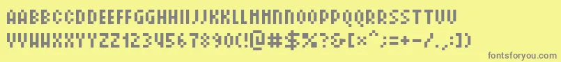 フォントRotorcapneueCondensed – 黄色の背景に灰色の文字