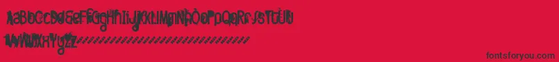 FtTwistedOntogenesisDemoversion Font – Black Fonts on Red Background