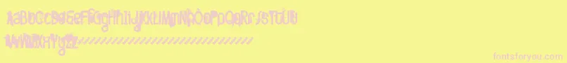 FtTwistedOntogenesisDemoversion Font – Pink Fonts on Yellow Background