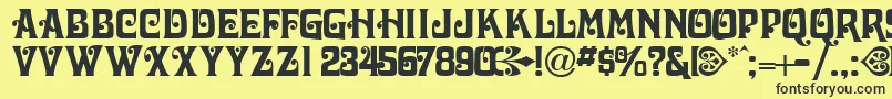 VictorianadisplaycapssskRegular Font – Black Fonts on Yellow Background