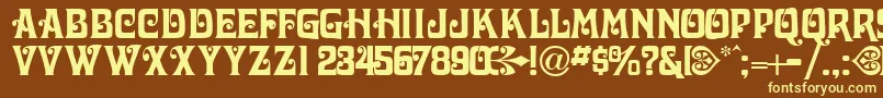 VictorianadisplaycapssskRegular Font – Yellow Fonts on Brown Background