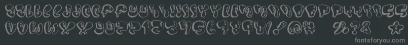 Sumo-fontti – harmaat kirjasimet mustalla taustalla