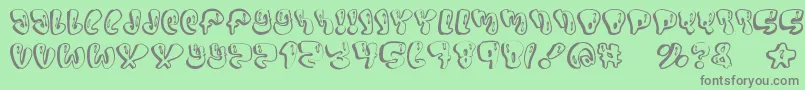 Sumo-Schriftart – Graue Schriften auf grünem Hintergrund