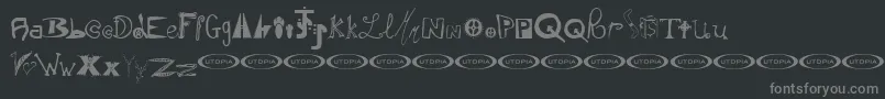 Instsm-fontti – harmaat kirjasimet mustalla taustalla