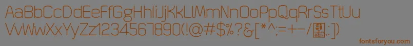 QuizmaLightDemo Font – Brown Fonts on Gray Background