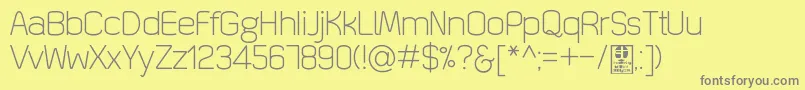 QuizmaLightDemo Font – Gray Fonts on Yellow Background