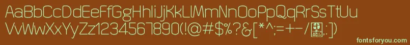 フォントQuizmaLightDemo – 緑色の文字が茶色の背景にあります。
