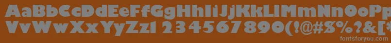 GimletblacksskBold-Schriftart – Graue Schriften auf braunem Hintergrund