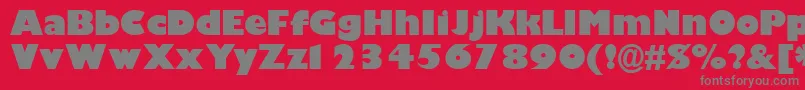 GimletblacksskBold-Schriftart – Graue Schriften auf rotem Hintergrund