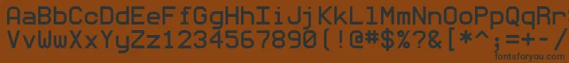 フォントMonommm5 – 黒い文字が茶色の背景にあります