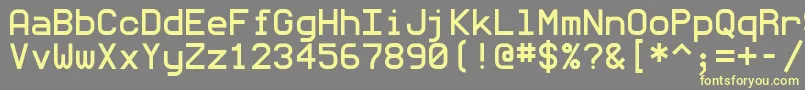 Monommm5-fontti – keltaiset fontit harmaalla taustalla