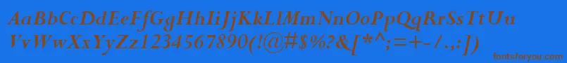 PerpetuaРџРѕР»СѓР¶РёСЂРЅС‹Р№РљСѓСЂСЃРёРІ Font – Brown Fonts on Blue Background