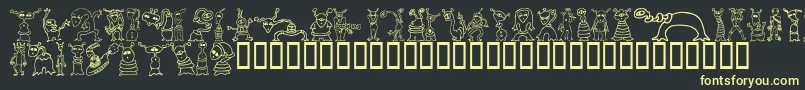 AlienTwits Font – Yellow Fonts on Black Background