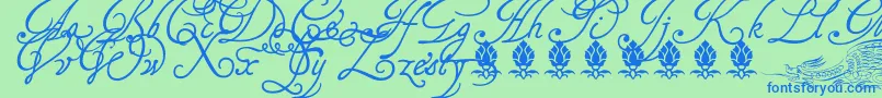 Tagettp2U-Schriftart – Blaue Schriften auf grünem Hintergrund