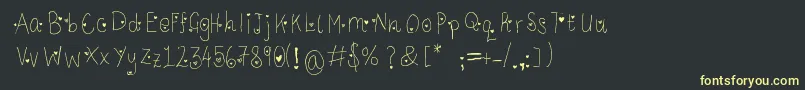 フォントLcLookWithYourHeart – 黒い背景に黄色の文字