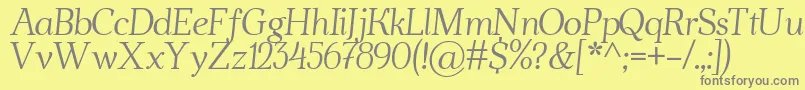 AhellyaItalic-fontti – harmaat kirjasimet keltaisella taustalla