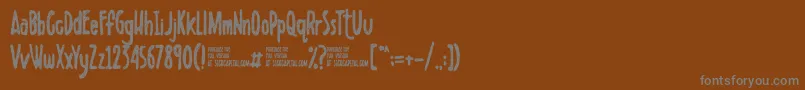 フォントScribbletdemo – 茶色の背景に灰色の文字