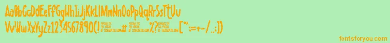 Шрифт Scribbletdemo – оранжевые шрифты на зелёном фоне