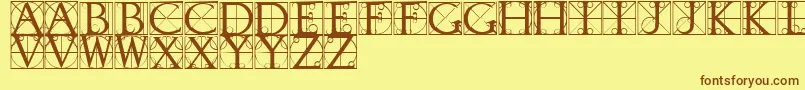 TypographerCaps-fontti – ruskeat fontit keltaisella taustalla
