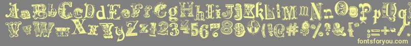 HarlequinadeMadness Font – Yellow Fonts on Gray Background