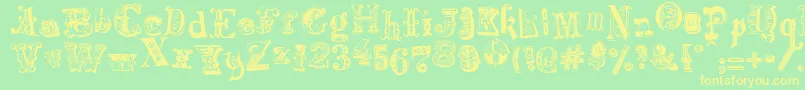 HarlequinadeMadness Font – Yellow Fonts on Green Background