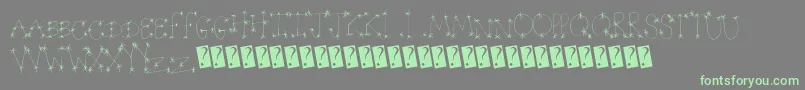 フォントStarwonder – 灰色の背景に緑のフォント