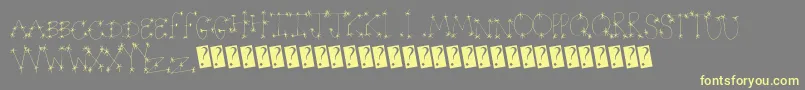 Starwonder Font – Yellow Fonts on Gray Background