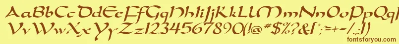 フォントDortmunddbItalic – 茶色の文字が黄色の背景にあります。