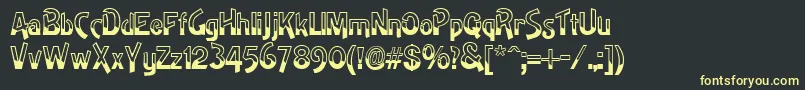 フォントGeDipped – 黒い背景に黄色の文字