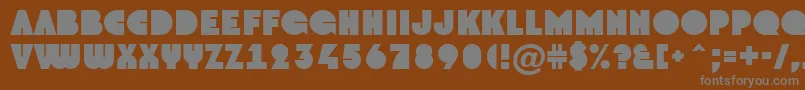 AGroto-fontti – harmaat kirjasimet ruskealla taustalla
