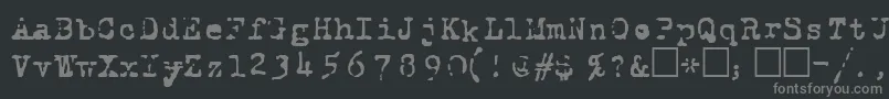 フォントRoyalp – 黒い背景に灰色の文字