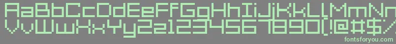 Fonte Acme7Wide – fontes verdes em um fundo cinza