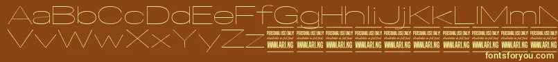 SpecifypersonalExexpthin Font – Yellow Fonts on Brown Background