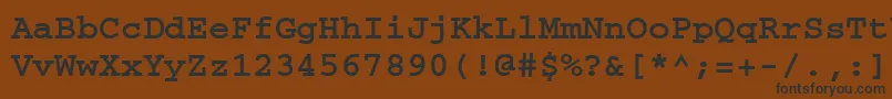 フォントCourierkoicttBold – 黒い文字が茶色の背景にあります