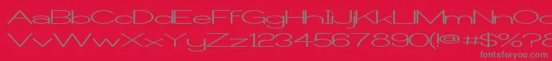 CastorgateWide-Schriftart – Graue Schriften auf rotem Hintergrund