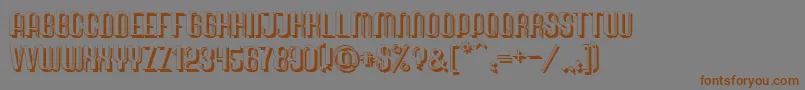 フォントQuimbieShaddow – 茶色の文字が灰色の背景にあります。