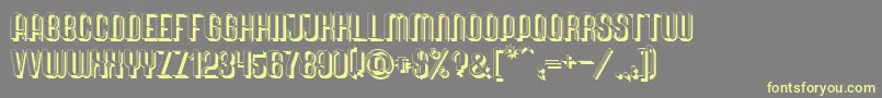 QuimbieShaddow-Schriftart – Gelbe Schriften auf grauem Hintergrund