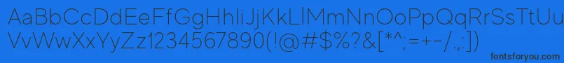 MadeEvolveSansThinPersonalUse-Schriftart – Schwarze Schriften auf blauem Hintergrund