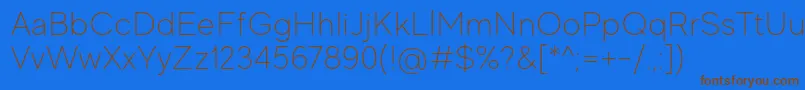 フォントMadeEvolveSansThinPersonalUse – 茶色の文字が青い背景にあります。