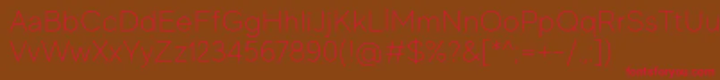 MadeEvolveSansThinPersonalUse Font – Red Fonts on Brown Background