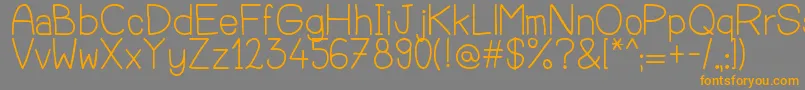 Lucjano Font – Orange Fonts on Gray Background