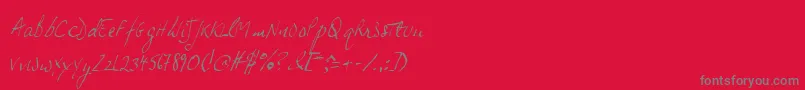 フォントJphsl – 赤い背景に灰色の文字