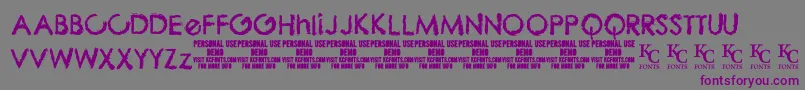 フォントThebizdemoKcfonts – 紫色のフォント、灰色の背景