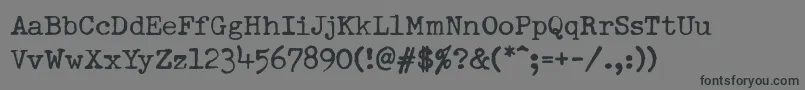 DumboldtypewriterNormal Font – Black Fonts on Gray Background