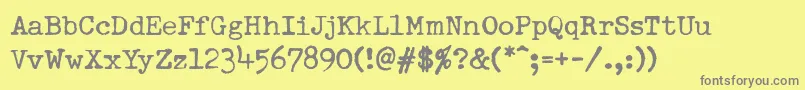 DumboldtypewriterNormal Font – Gray Fonts on Yellow Background