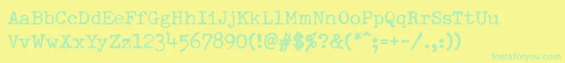 DumboldtypewriterNormal Font – Green Fonts on Yellow Background
