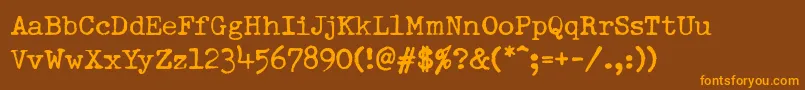 Шрифт DumboldtypewriterNormal – оранжевые шрифты на коричневом фоне