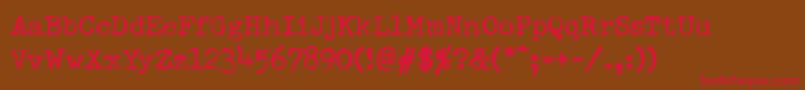 DumboldtypewriterNormal Font – Red Fonts on Brown Background